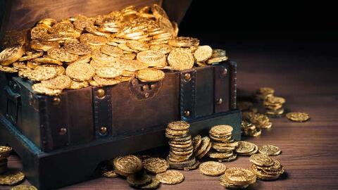 Vàng thế giới giảm gần 1% khi đồng USD mạnh lên