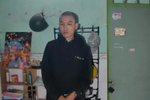 Mua tiền giả về đưa cho cha, cả 2 bị khởi tố