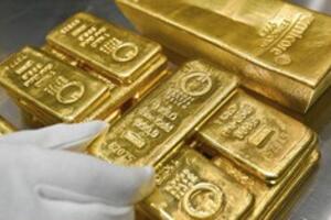 Giá vàng châu Á hạ nhiệt khi căng thẳng tại Trung Đông lắng xuống