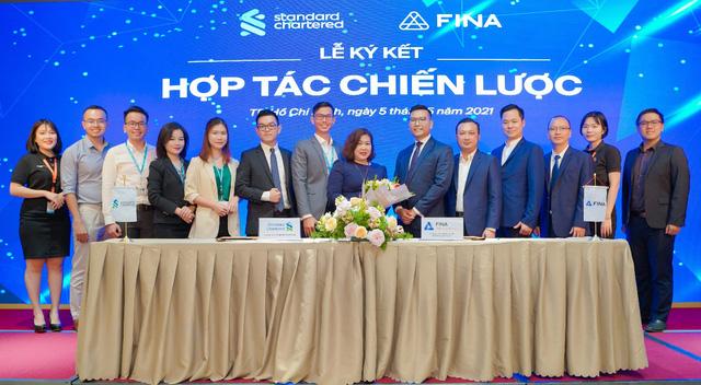 FINA hợp tác chiến lược toàn diện cùng Standard Chartered Việt Nam - Ảnh 2. FINA hợp tác chiến lược toàn diện cùng Standard Chartered Việt Nam - Ảnh 2.