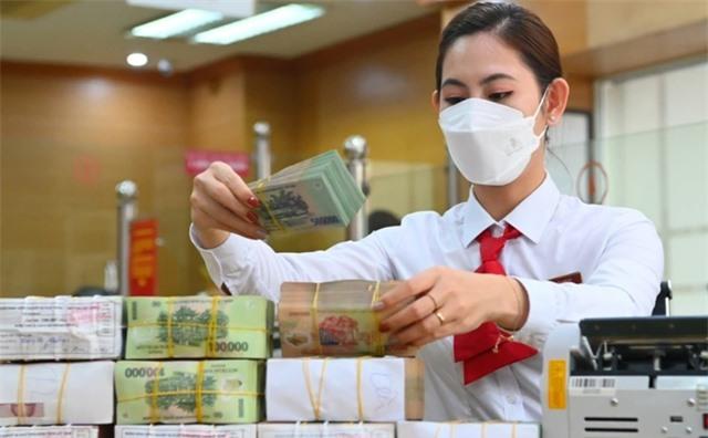 Tín dụng tăng trưởng chậm, chưa bằng 50% so với cùng kỳ - Ảnh 1.