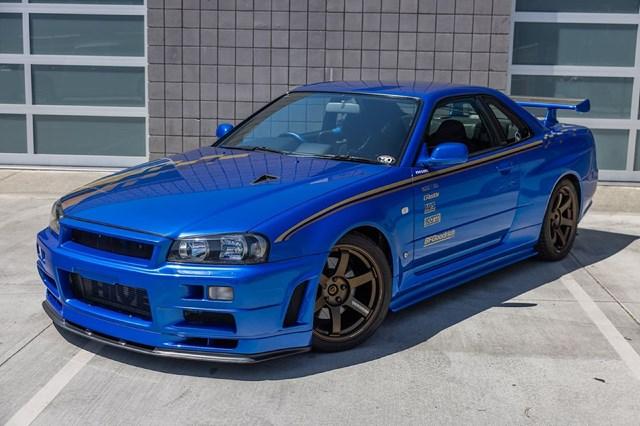 Cần bao nhiêu để sở hữu chiếc xe đua huyền thoại Nissan Skyline GT-R R34? - Ảnh 1.