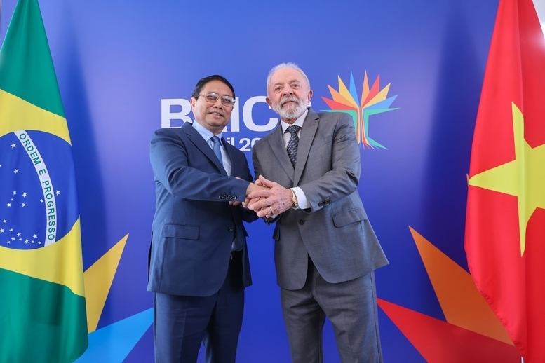 Thủ tướng Chính phủ Phạm Minh Chính và Tổng thống Brazil Luiz Inacio Lula da Silva - Ảnh: VGP/Nhật BắcX